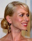 Naomi Watts with her hair in a ballet style bun