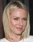 Naomi Watts wearing her hair in a classic medium length bob with a middle part