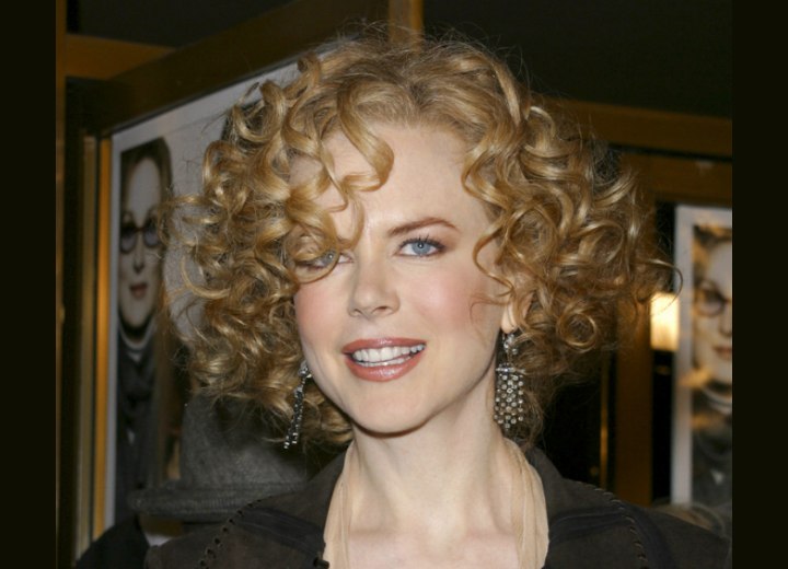 Nicole Kidman's with short curly hair