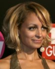 Nicole Richie with her hair cut short in a layered bob