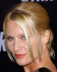 Nicollette Sheridan with her hair pulled back into a ponytail