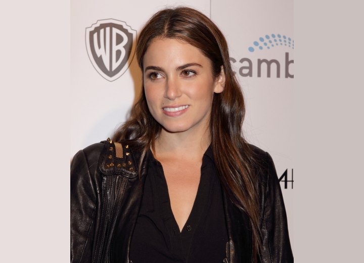 Nikki Reed with brown and shiny long hair