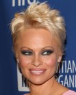 Pamela Anderson with her hair chopped short into a pixie