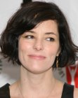 Parker Posey wearing her hair in a short bob with sides that flip out