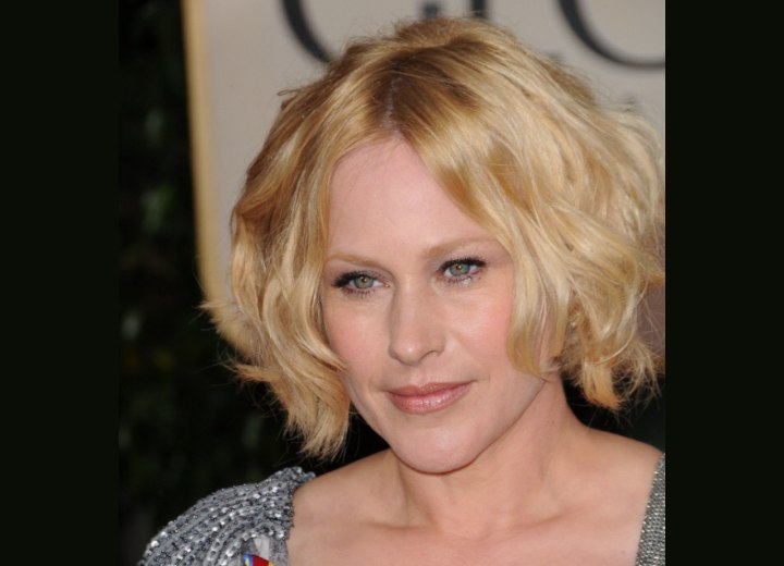 Patricia Arquette with short hair and curls