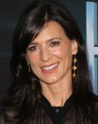 Perrey Reeves aged over 40 and wearing long hair with side bangs