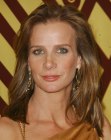 Rachel Griffiths wearing a long hairstyle with her hair styled away from the face