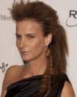 Rachel Griffiths with her hair crimped and styled away from her face