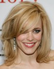 Rachel McAdams with her hair styled over one of her eyes