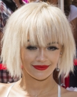 Rita Ora's platinum blonde bob with long bangs