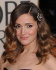 Rose Byrne wearing her hair long with waves and a barrette
