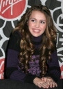 Miley Cyrus with long coils