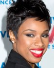 Jennifer Hudson with her hair cut in a pixie with height in the crown
