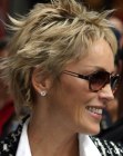 Sharon Stone wearing her hair very short with messy styling