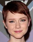 Valorie Curry's red hair cut short in a pixie style