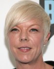 Tabatha Coffey's short hairstyle with a side fringe