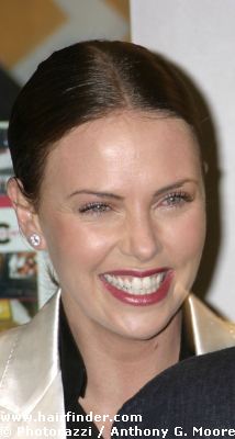 Charlize Theron with up style hair