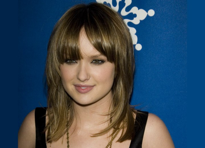Kaylee DeFer with her hair in a long textured cut