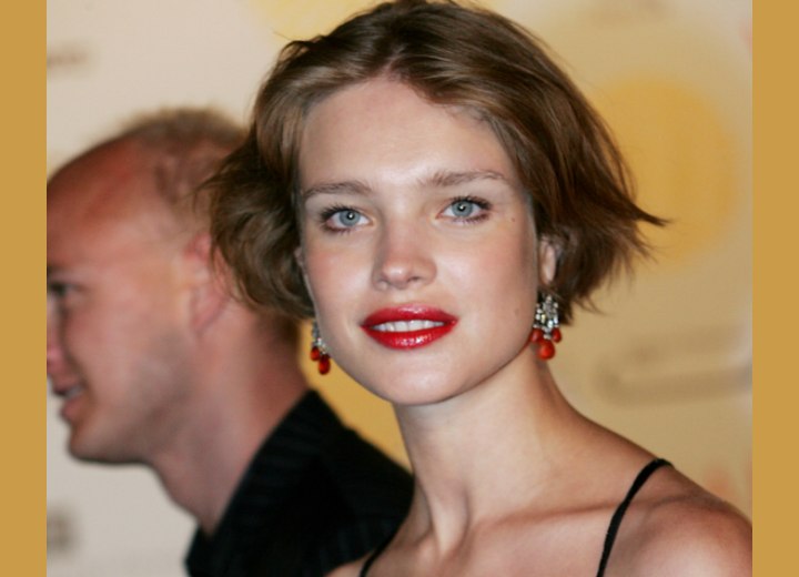 Natalia Vodianova - Short hairstyle with waves and a centered part