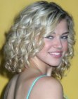 Adrianne Palicki wearing blonde above the shoulders hair with curls
