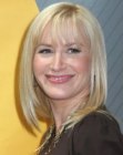 Angela Kinsey with smooth shoulder length hair and bangs