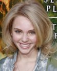 Anna Sophia Robb wearing her hair at mid-length with rounded styling