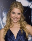 Ashley Benson's long hair with soft waves for volume