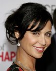 Catherine Bell with her hair pulled back and styled up