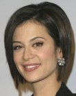 Catherine Bell sporting a lifted bob with razor texturing