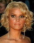Jessica Simpson wearing neck length hair with curls