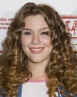 Joss Stone's with long curled hair that softens her face