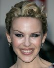 Kylie Minogue with her short hair styled in a retro hairstyle