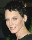 Lori Petty's very short hairstyle with irregular lengths
