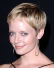 Marley Shelton sporting a short pixie hairstyle with cute short bangs