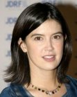 Phoebe Cates sporting a mid length hairstyle with the hair cut just above the shoulders