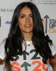 Salma Hayek's long black hair with layers and spiral curled ends