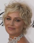 Sharon Stone's short shag haircut with curls and straight sections
