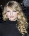 Taylor Swift with her hair curled away from her face