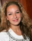 Vanessa Lengies with a curly body permanent hairstyle