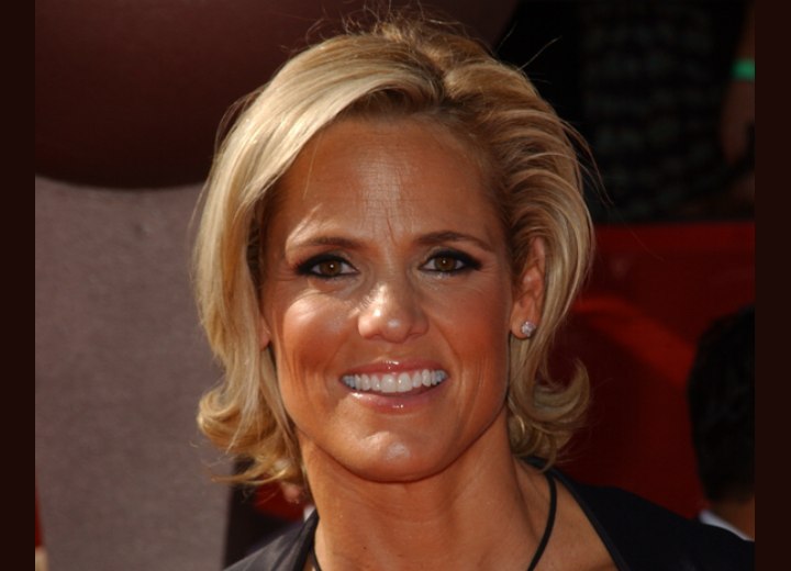 Dara Torres presents a refreshing short hairstyle that moves into a large 