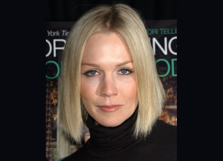 Jennie Garth with her hair in a bob and wearing a black turtleneck