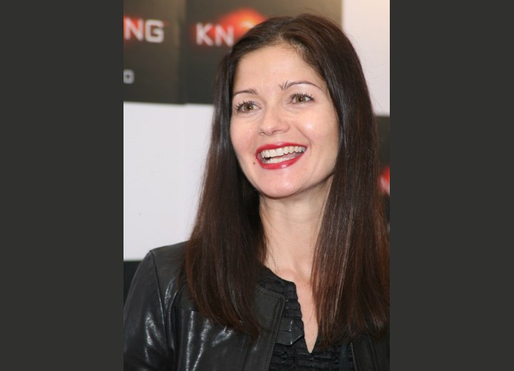 Jill Hennessy wearing her brunette long and loose
