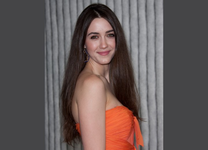Madeline Zima - Long brown hair with an angled center part
