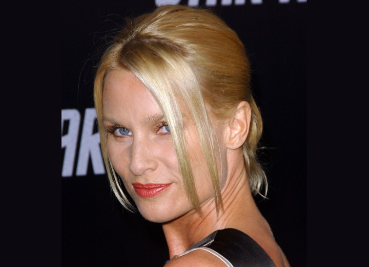 Nicollette Sheridan - Natural hairstyle with a ponytail
