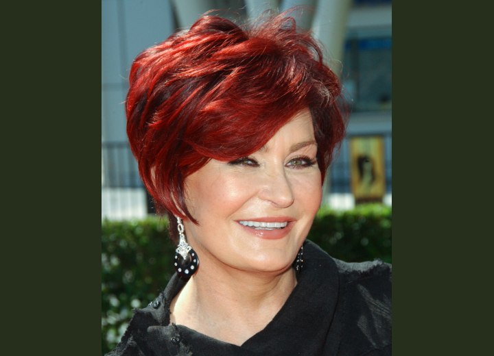 Sharon Osbourne with professional short red hair