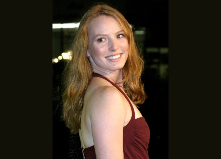 Side view of Alicia Witt's long hairstyle