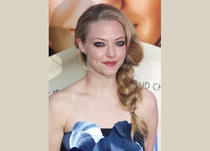Amanda Seyfried with her hair styled into a fat braid