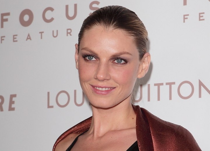 Angela Lindvall with her hair styled sleek and backwards
