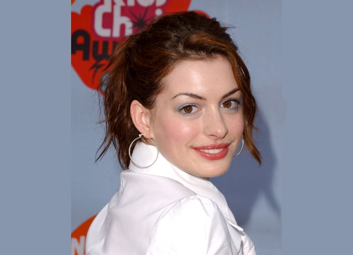 Anne Hathaway wearing her hair pulled back