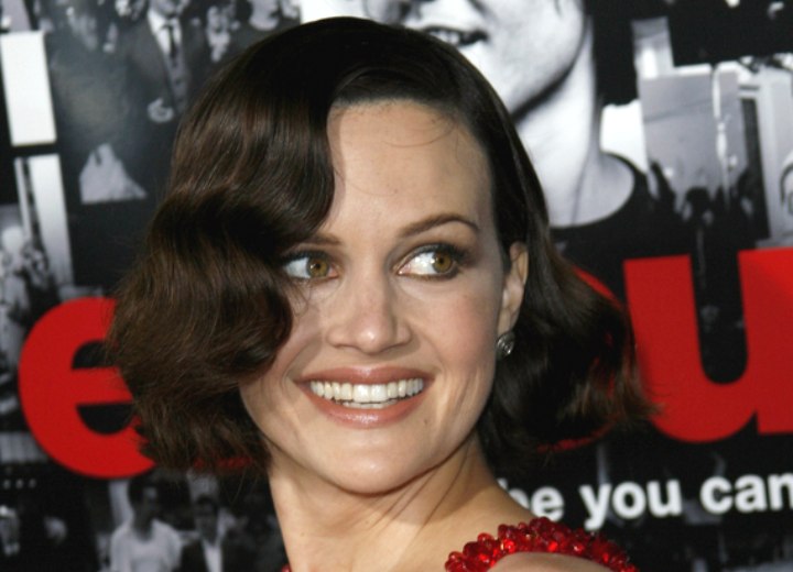 Previous Carla Gugino sporting a retro look